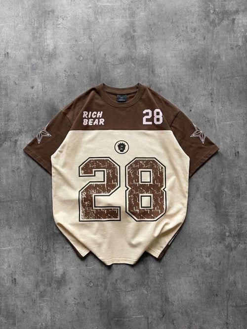 Baseball-style jersey with number 28 on a gray concrete background
